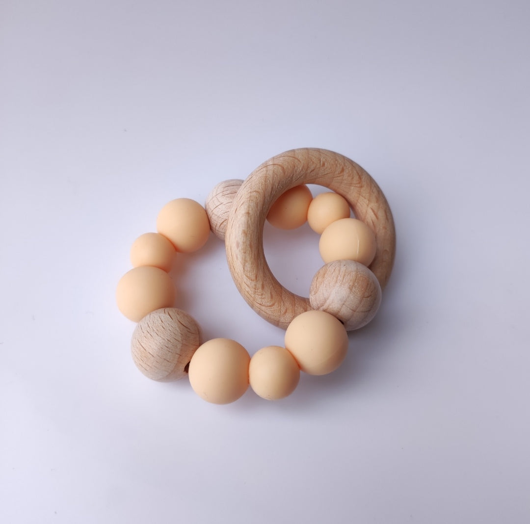 Silicone and wood ring teether