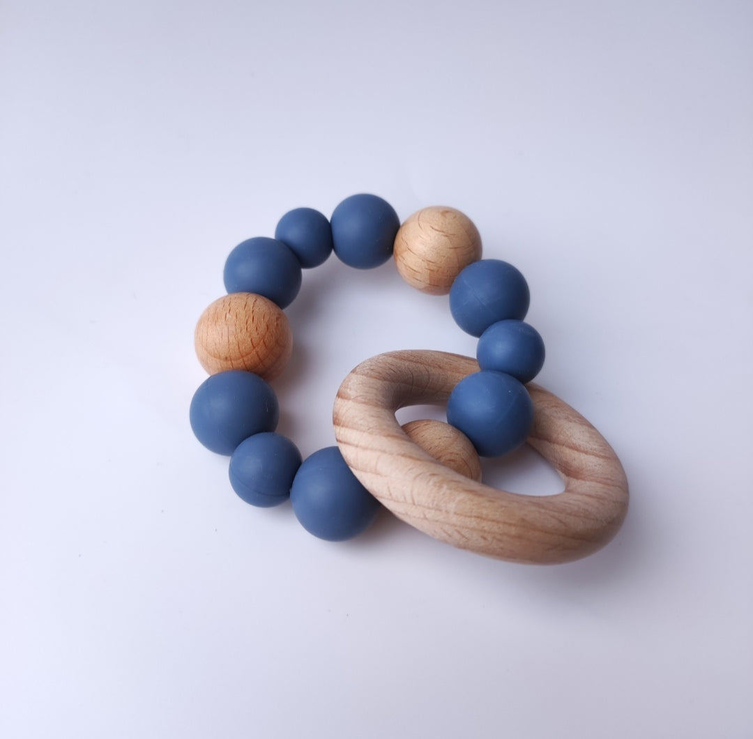 Silicone and wood ring teether